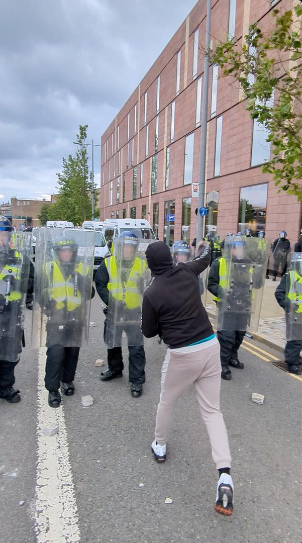 A man throws an object during anti-immigration demonstrations in Sunderland, Britain August 2, 2024 in this still image obtained from a social media video. TikTok @whatsthecracklike/via REUTERS  THIS IMAGE HAS BEEN SUPPLIED BY A THIRD PARTY. MANDATORY CREDIT. NO RESALES. NO ARCHIVES. Photo: @whatsthecracklike/REUTERS