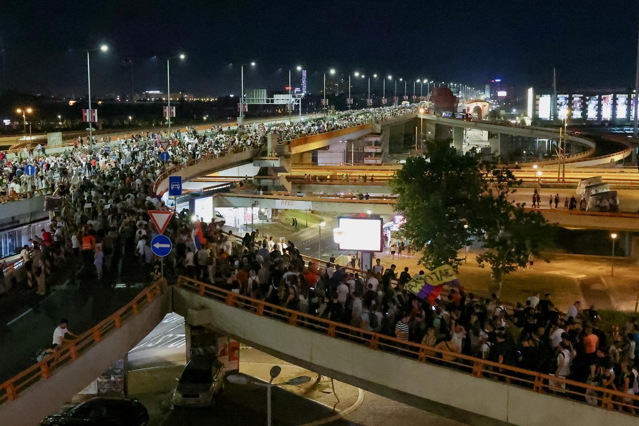 People attend a protest against Rio Tinto's lithium mining project, in Belgrade