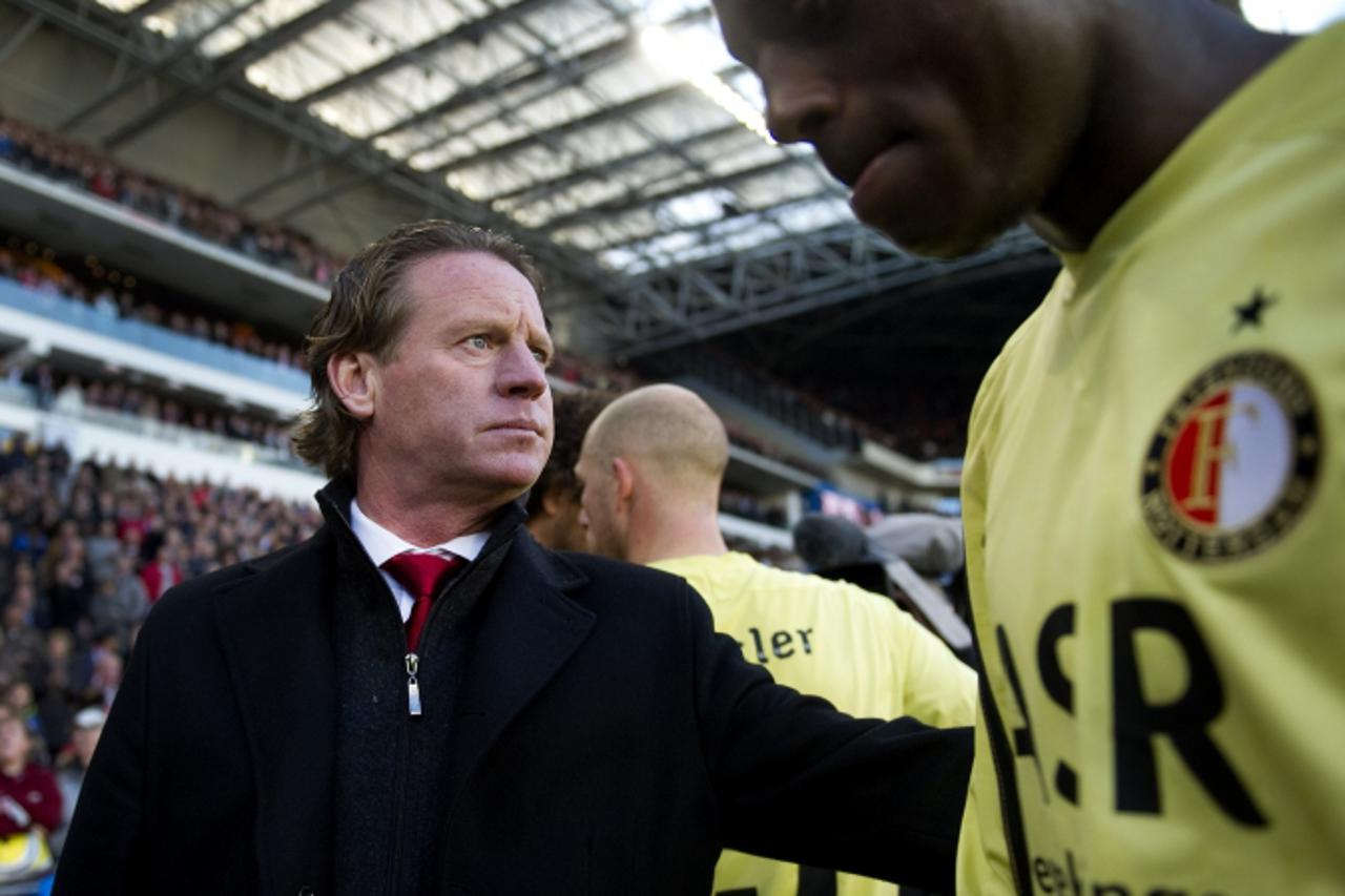 'Feyenoord coach Mario Been (L) reacts after his team lost against PSV with 10-0. PSV inflicted a 10-0 drubbing on Feyenoord in the Dutch league today, the worst defeat in the latter club\'s long hist