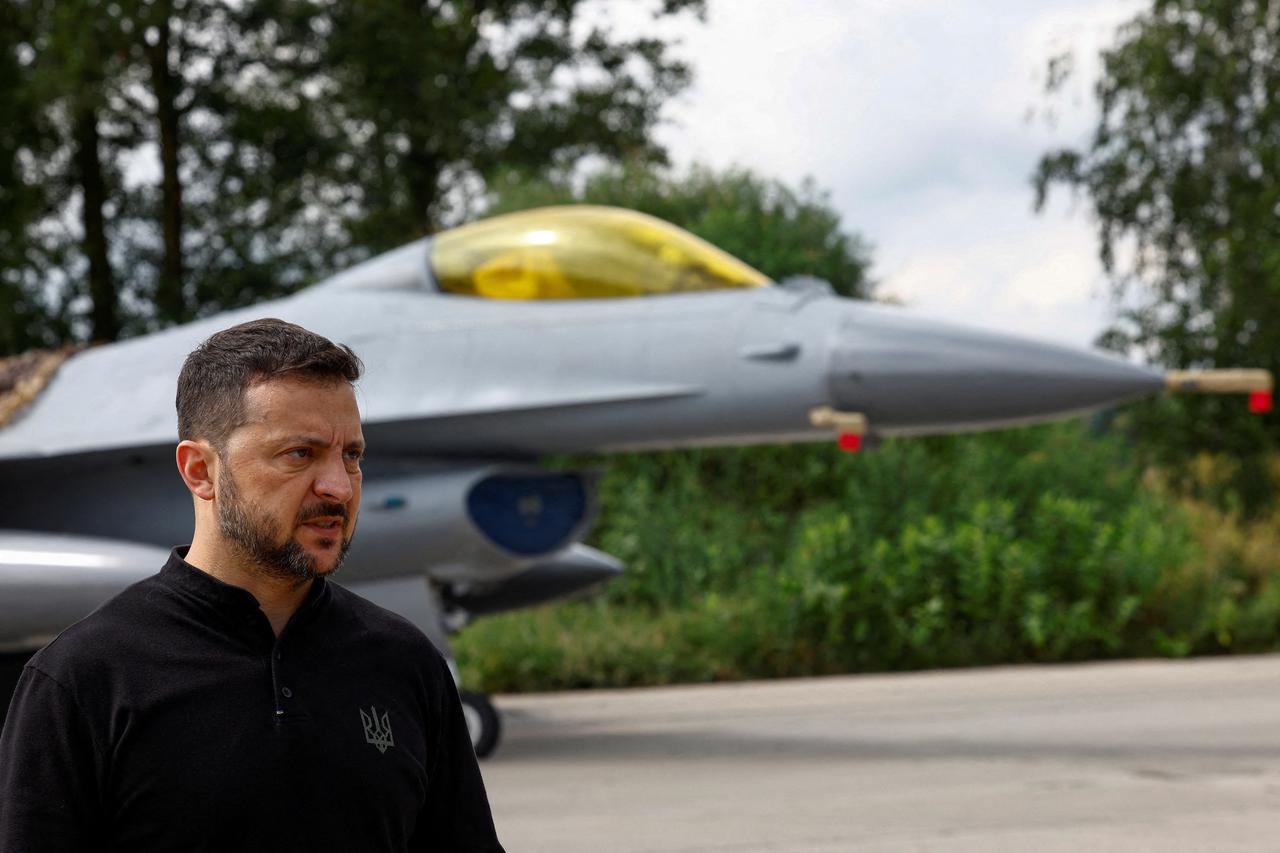 FILE PHOTO: Ukrainian F-16 fighting aircrafts are seen in the air during marking the Day of the Ukrainian Air Forces in an undisclosed location in Ukraine