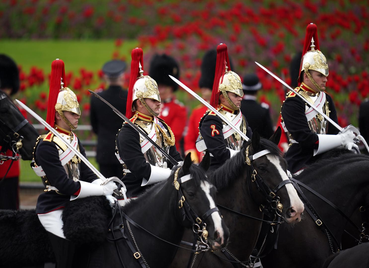 Members of the Household Cavalry make their way along The Mall ahead of the coronation ceremony of King Charles III and Queen Camilla in central London. Picture date: Saturday May 6, 2023. Photo: Niall Carson/PRESS ASSOCIATION