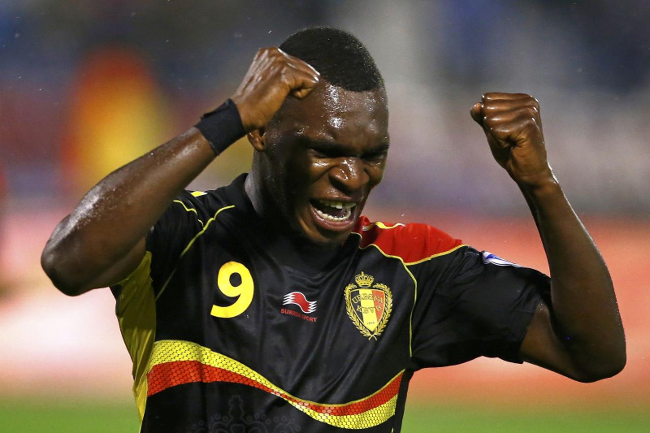 'Belgium's Christian Benteke (2ndL) celebrates his goal against Serbia during their 2014 World Cup Group A qualifying soccer match at the Red Star Stadium in Belgrade October 12, 2012.               