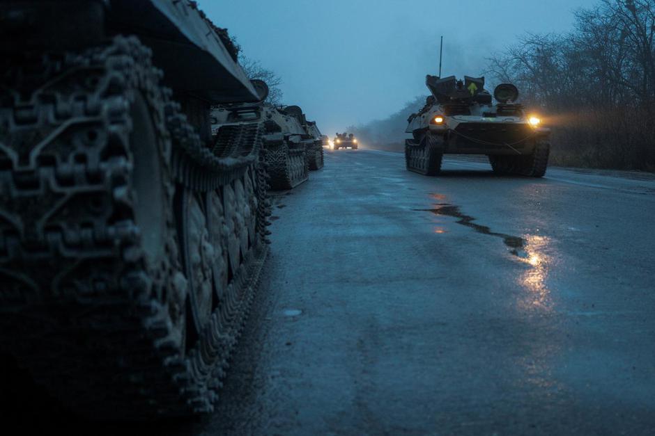 Armoured personnel carriers of the Ukrainian Armed Forces are seen on a road in Kherson region