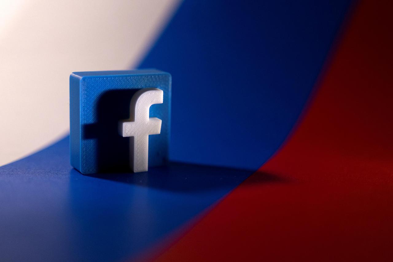 FILE PHOTO: Illustration shows Facebook logo and Russian flag