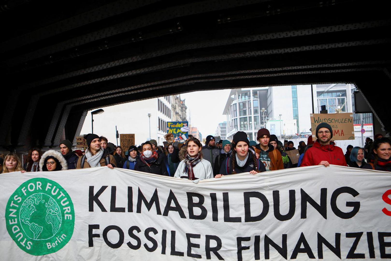 Global Climate Strike participants march with a banner and signs as part of the Fridays for Future movement in Berlin, Germany, March 3, 2023. REUTERS/Nadja Wohlleben Photo: NADJA WOHLLEBEN/REUTERS