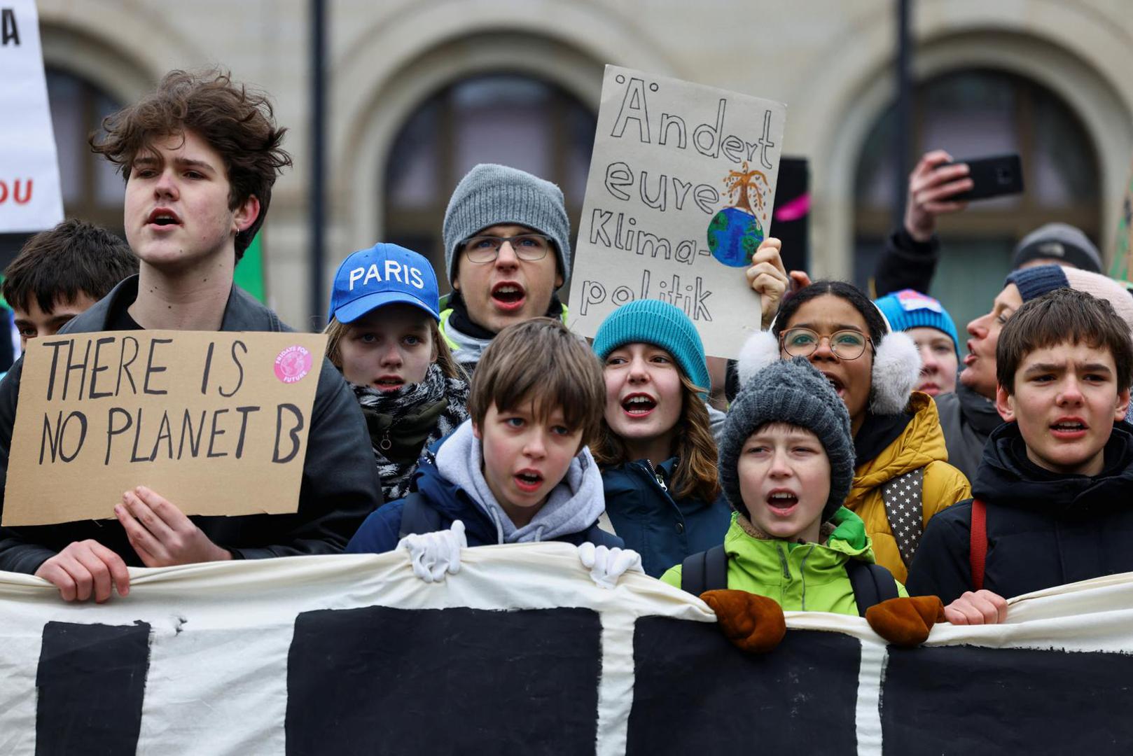 People take part in the Global Climate Strike of the movement Fridays for Future, in Berlin, Germany, March 3, 2023. The sign on the center reads: "Change your climate policy". REUTERS/Christian Mang Photo: CHRISTIAN MANG/REUTERS