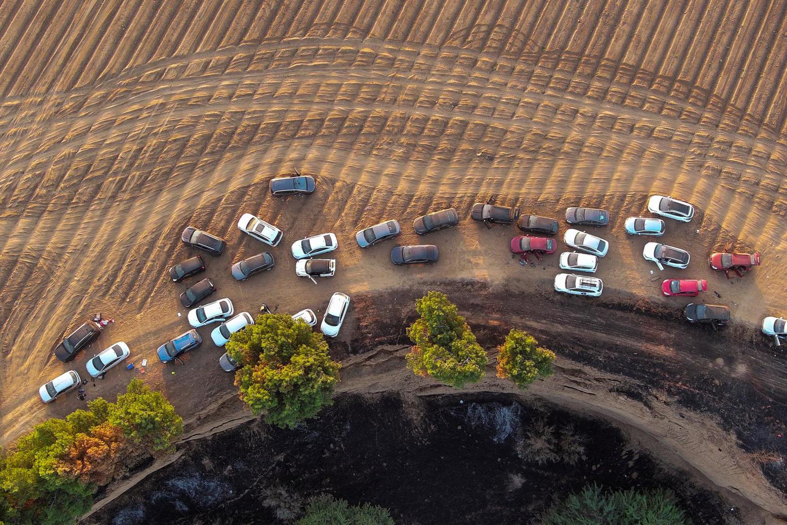 An aerial view shows the deserted cars of festival-goers at the site of an attack on the Nova Festival by Hamas gunmen from Gaza, near Israel's border with the Gaza Strip, in southern Israel, October 12, 2023. REUTERS/Ilan Rosenberg Photo: ILAN ROSENBERG/REUTERS