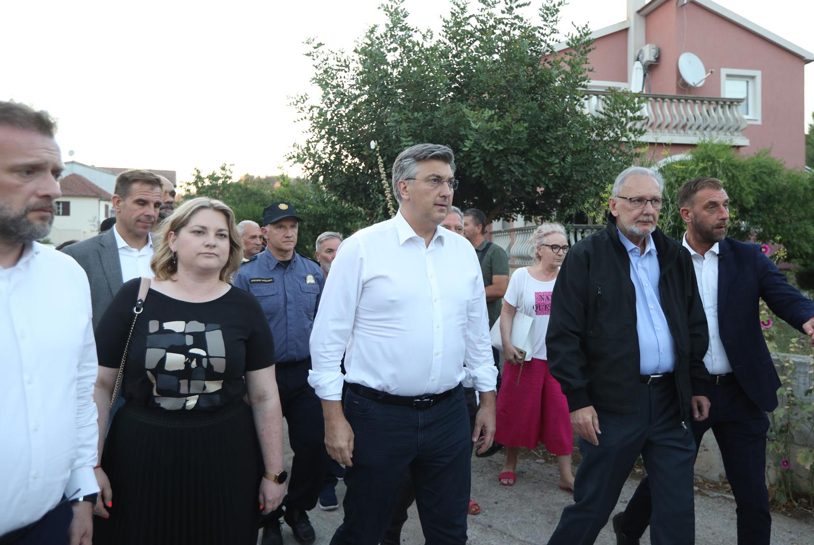 13.07.2022., Zaton - Premijer Andrej Plenkovic stigao je s ministrima u Zaton, gdje se sastao s vatrogascima i ostalim interventnim sluzbama. Nakon sastanka ispred Vatrogasnog doma u Zatonu dao je izjavu novinarima. Andrej Plenkovic, Davor Bozinovic, Marko jelic. Photo: Dusko Jaramaz/PIXSELL