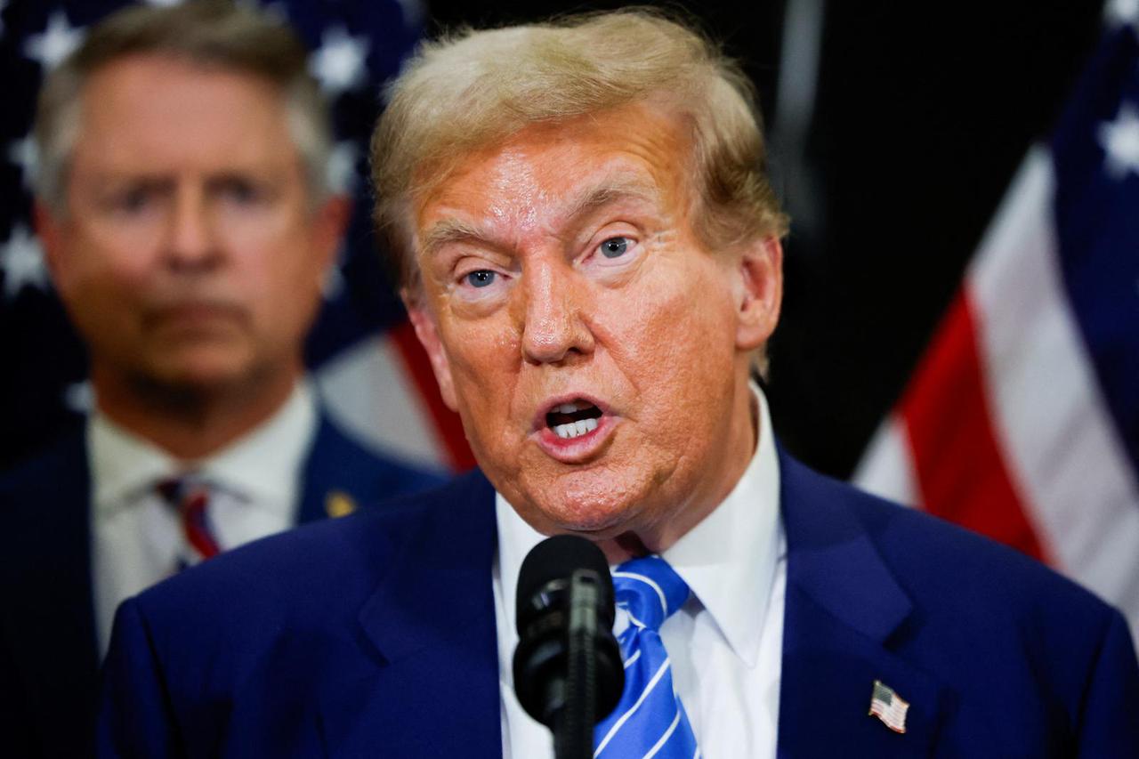 Republican presidential candidate Trump speaks to the media following meetings with Republicans on Capitol Hill, in Washington