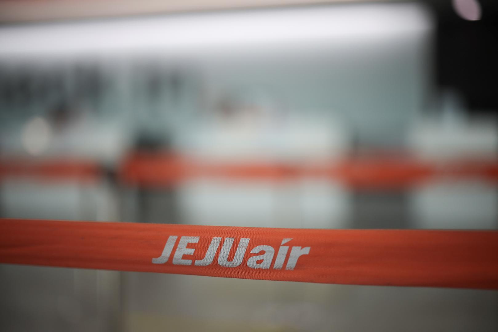 A barricade with the logo of Jeju Air is placed at Muan International Airport, in Muan, South Korea, December 29, 2024. REUTERS/Kim Hong-Ji Photo: KIM HONG-JI/REUTERS