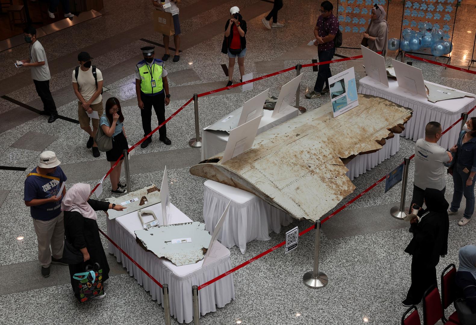 Visitors look at the wreckage of an aircraft believed to be from the missing Malaysia Airlines flight MH370 during a remembrance event marking the 10th anniversary of its disappearance, in Subang Jaya, Malaysia March 3, 2024. REUTERS/Hasnoor Hussain Photo: HASNOOR HUSSAIN/REUTERS