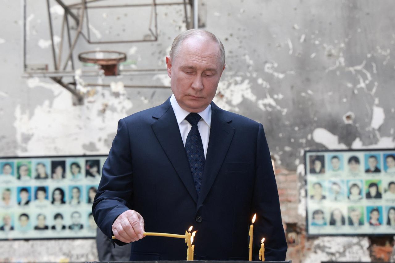 Russia's President Putin commemorates victims of 2004 school siege in Beslan