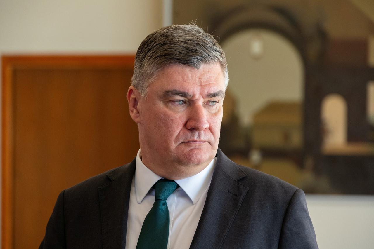 Croatian President Zoran Milanovic looks on while talking to the media at the Presidential Palace in Zagreb