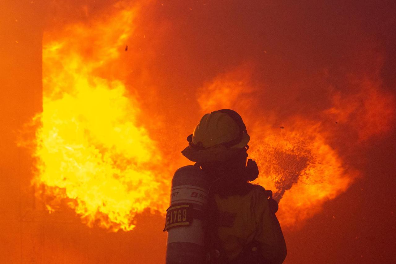 Palisades Fire burns during a windstorm on the west side of Los Angeles