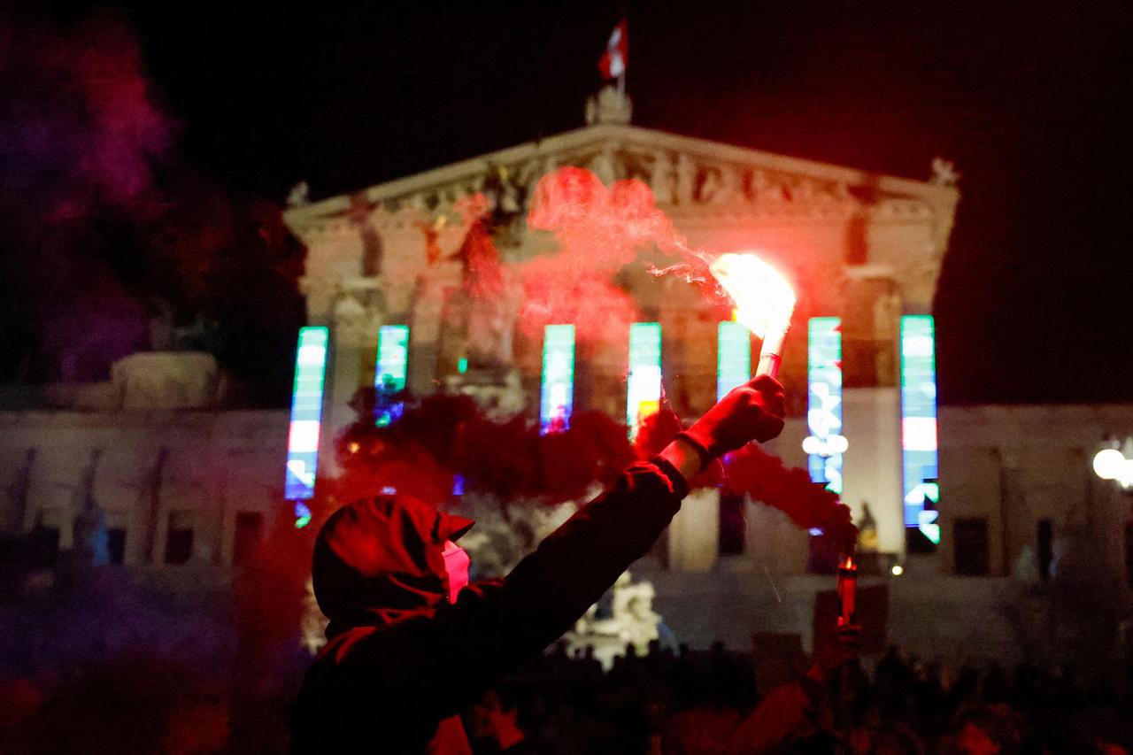 People attend a protest against Freedom Party after general elections in Vienna