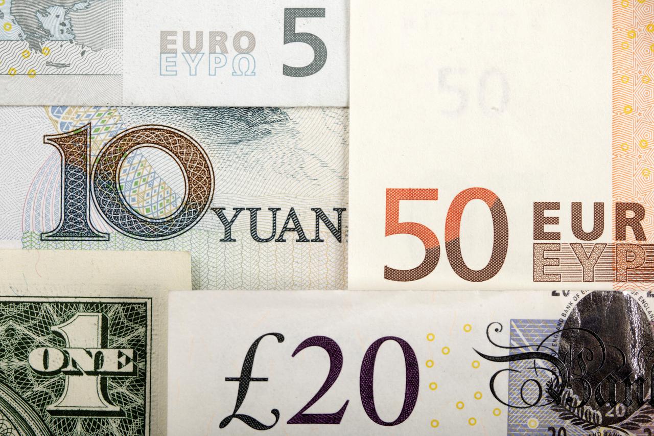 Arrangement of various world currencies including Chinese Yuan, US Dollar, Euro, British PoundArrangement of various world currencies including Chinese Yuan, US Dollar, Euro, British Pound, pictured January 25, 2011 REUTERS/Kacper Pempel/Illustration/File