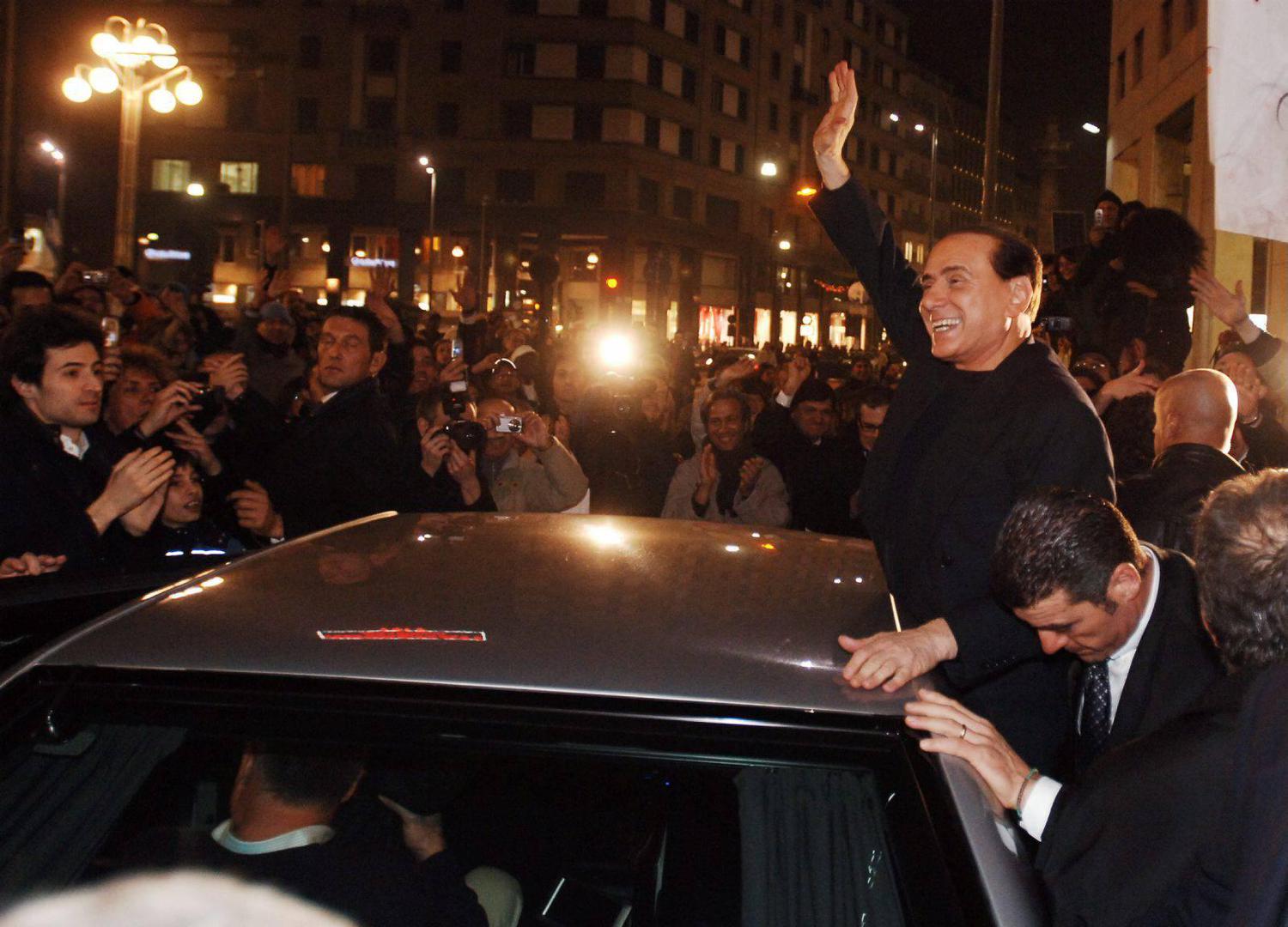 SILVIO BERLUSCONI CAMINA IN CORSO VITTORIO EMANUELE AND VISITS THE GAZEBO OF FORZA ITALIA AND GREETS BY GETTING ON THE CAR IN PIAZZA SAN BABILA FOR THE REFERENDUM ON THE CHOICE OF THE SYMBOL AND THE NAME OF THE NEW PARTY (Duilio Piaggesi, MILAN - 2007-12-02) ps la photo can be used in compliance with the context in which it was taken, and without the defamatory intent of the decorum of the people represented (Photo Repertorio - 2019-01-17, Duilio Piaggesi) ps the photo can be used in compliance with the context in which it is 'was taken, and without the defamatory intent of the decorum of the people represented Editorial Usage Only Photo: Duilio Piaggesi/IPA