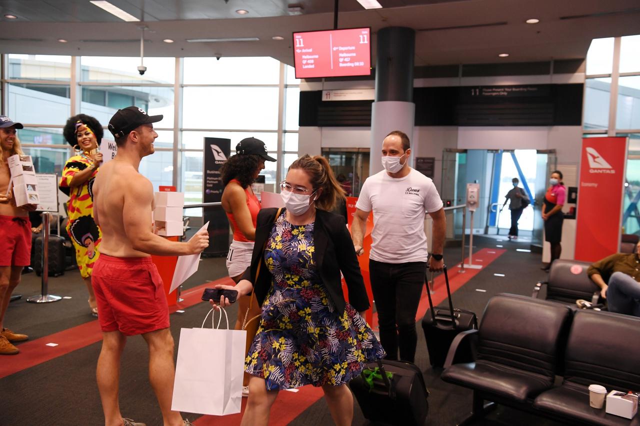 Passengers disembark from the first Qantas flight from Melbourne in Sydney