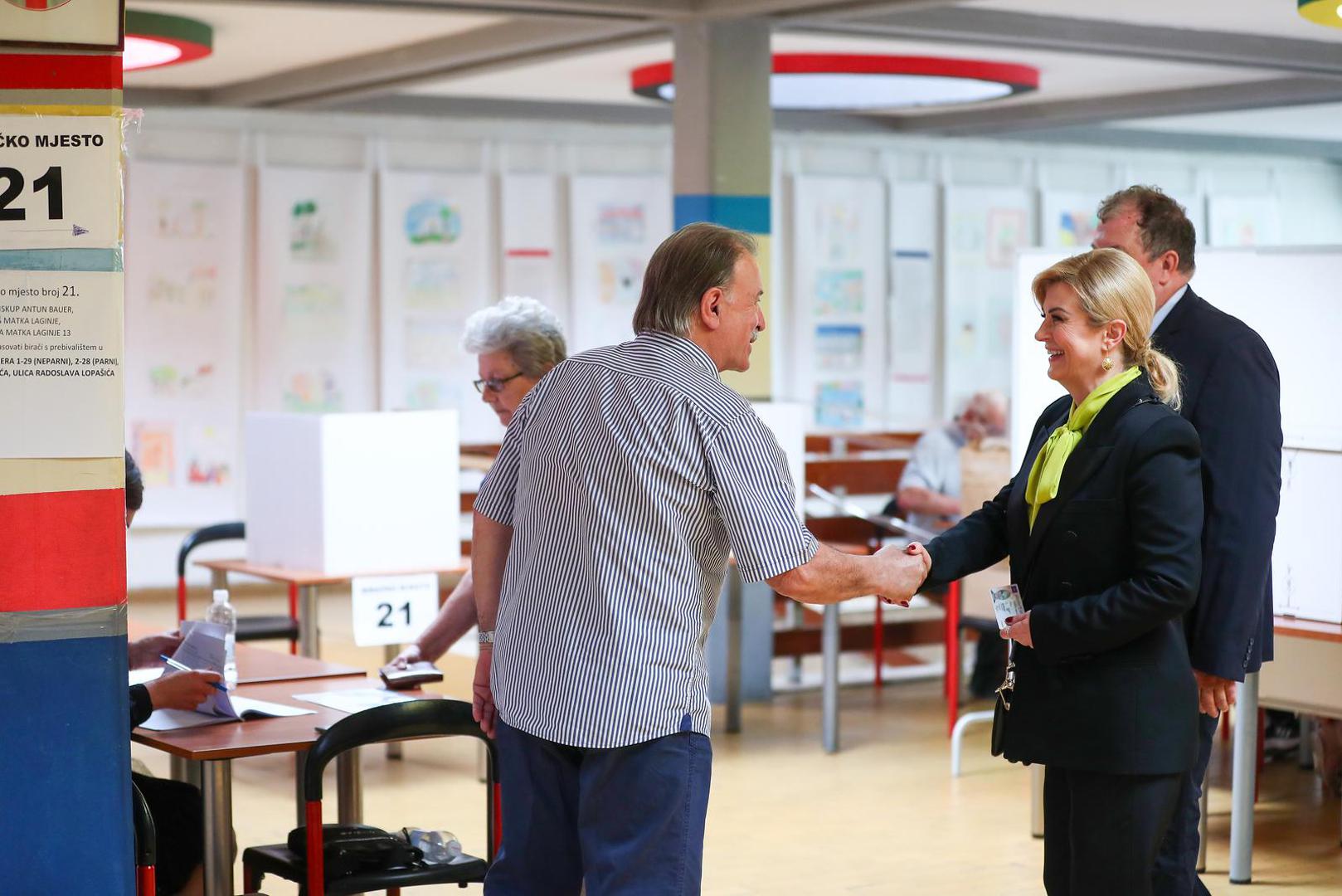 09.06.2024., Zagreb -  Na birackom mjestu br 21: Osnovna skola Matka Laginje svoju glasacku duznost obavila je Kolinda Grabar Kitarovic sa suprugom Jakovom. Photo: Matija Habljak/PIXSELL