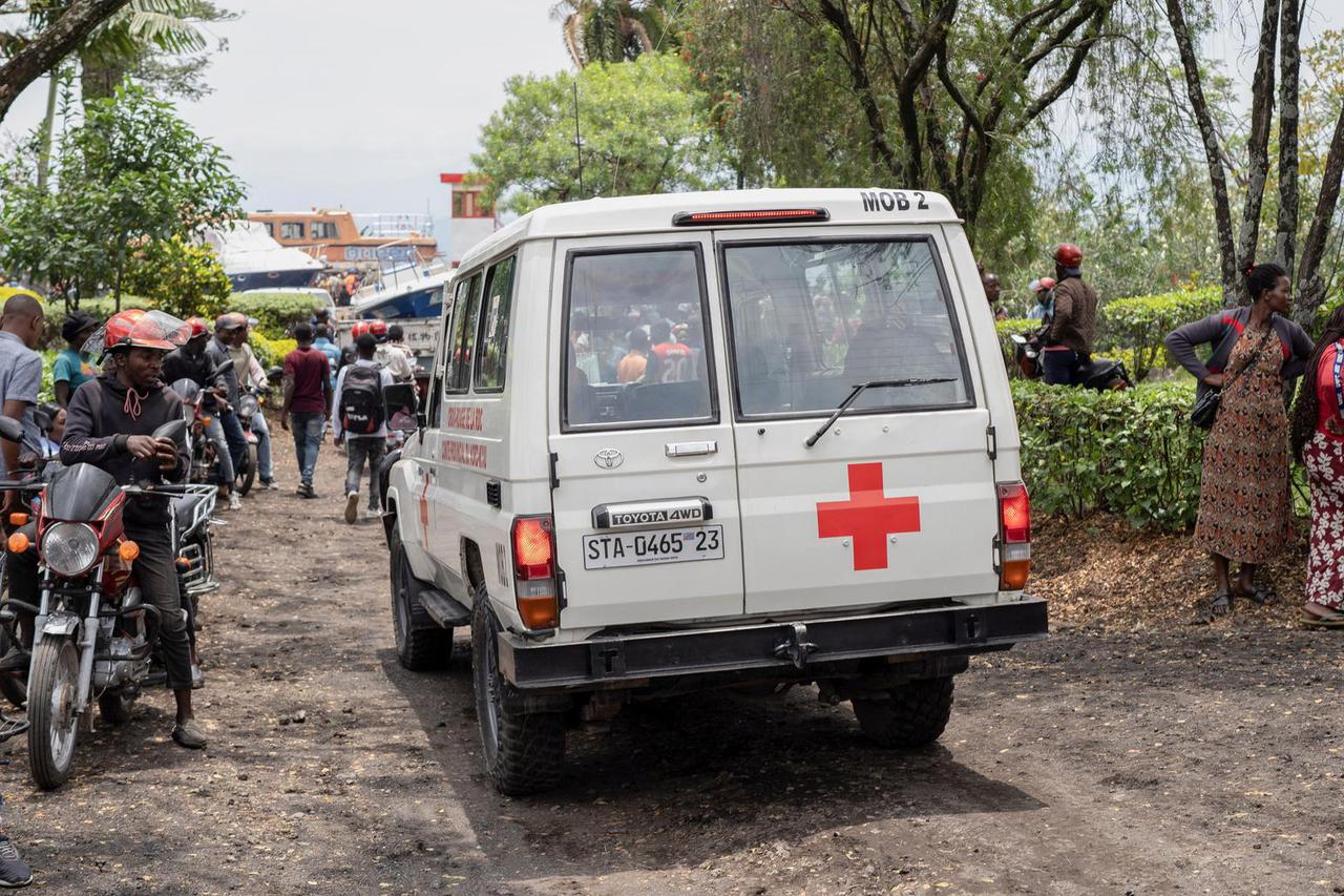 A rescue ambulance drives to the shores of Lake Kivu after a boat ferrying passengers and goods from the Minova villages sank near the Port of Kituku in Goma