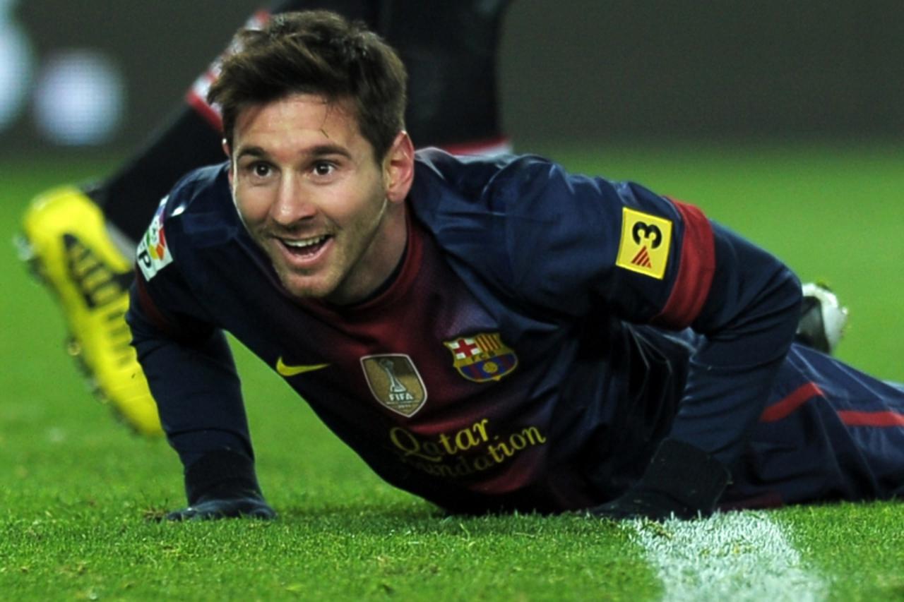 'TOPSHOTS - Barcelona\'s Argentinian forward Lionel Messi reacts during the Spanish league football match FC Barcelona vs Athletic Bilbao at the Camp Nou stadium in Barcelona on December 1, 2012. FC B