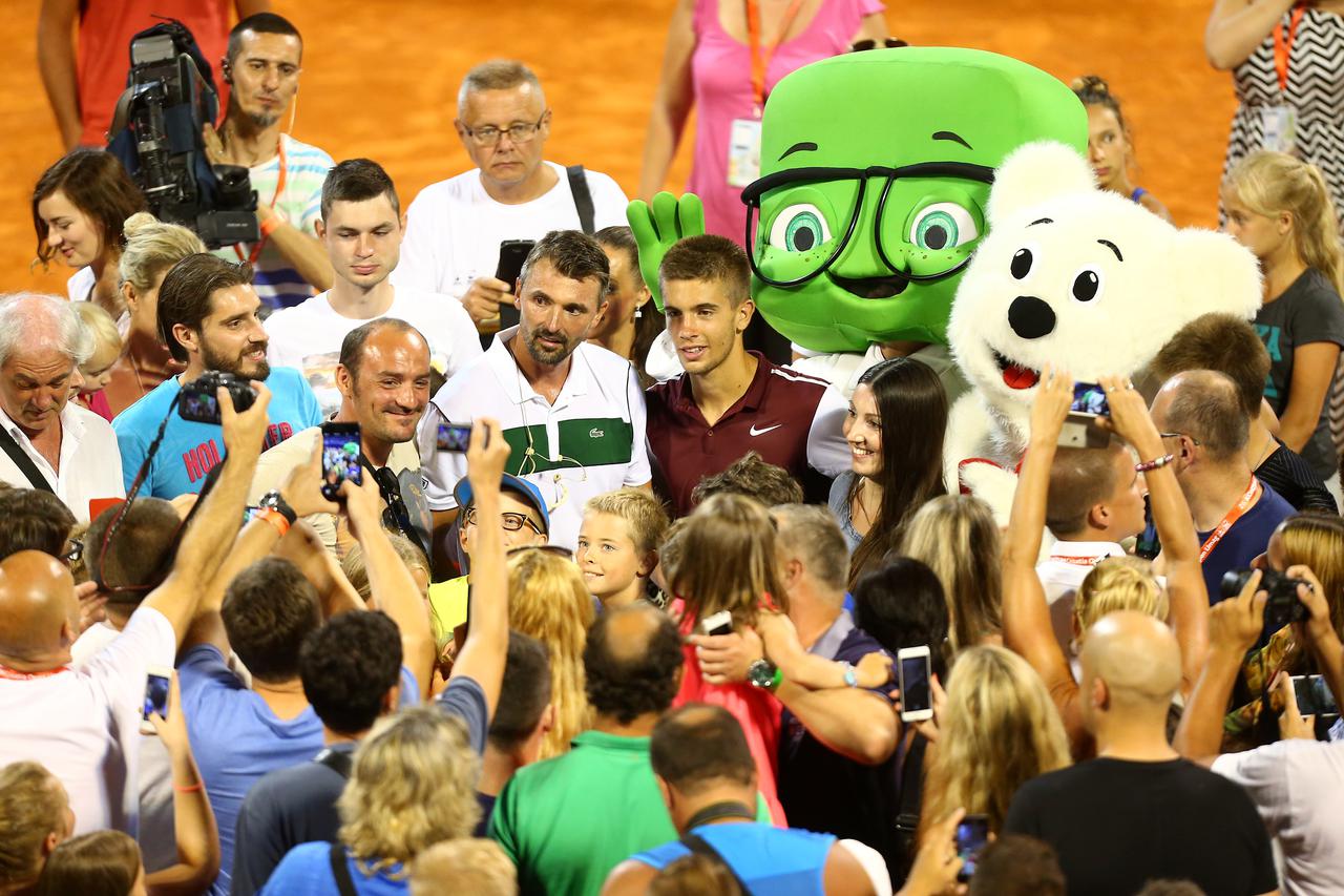 18.07.2015., Umag - 26. ATP teniski turnir, egzibicijski mec Goran Ivanisevic i prijatelji. Goran Ivanisevic, Borna Coric. Photo: Slavko Midzor/PIXSELL