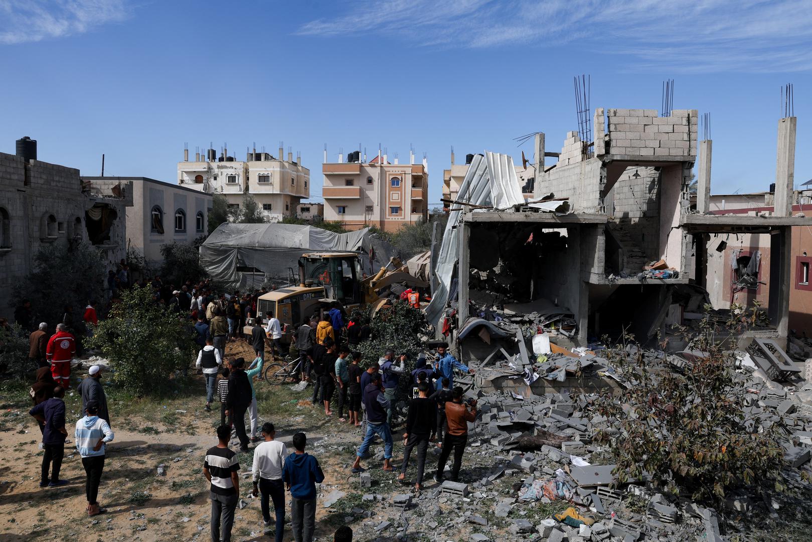 Palestinians gather at the site of an Israeli strike on a house, amid the ongoing conflict between Israel and Hamas, in Rafah in the southern Gaza Strip, March 1, 2024. REUTERS/Ibraheem Abu Mustafa Photo: IBRAHEEM ABU MUSTAFA/REUTERS