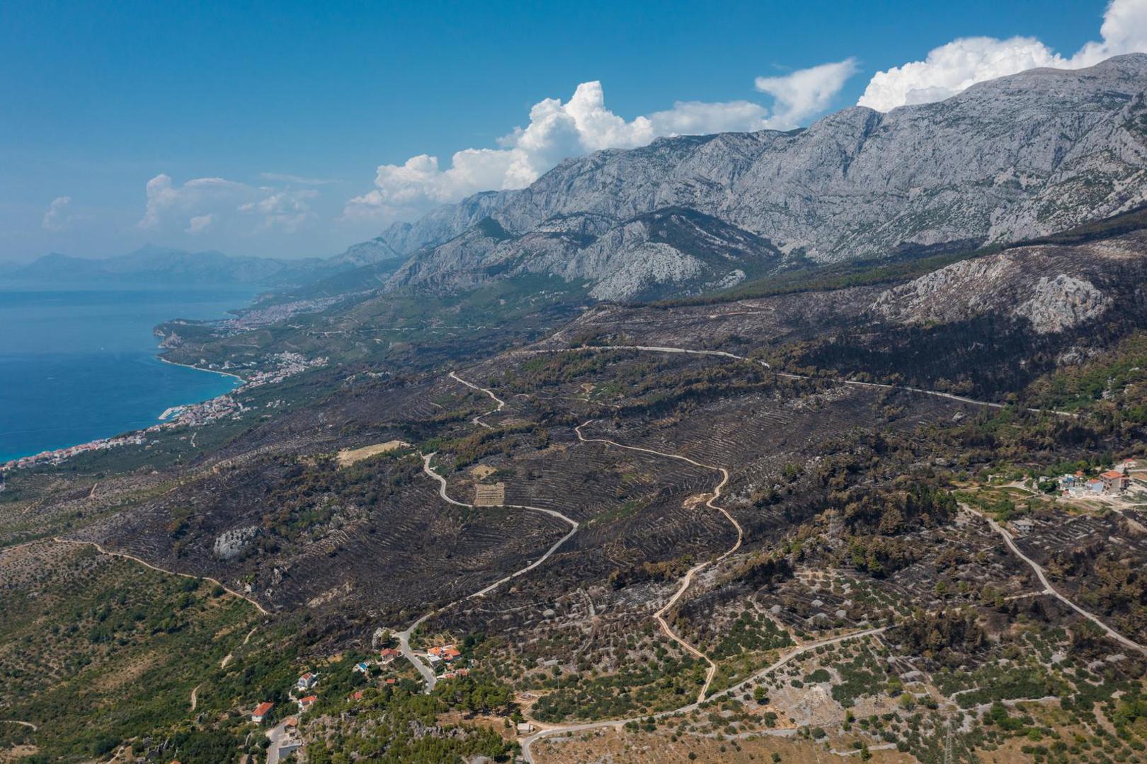 03.08.2024. Gornje Tucepi
Fotografije iz zraka opožarenog podrucja od Tucepi do Gornje Podgore i Parka prirode Biokovo. Photo: Matko Begovic/PIXSELL