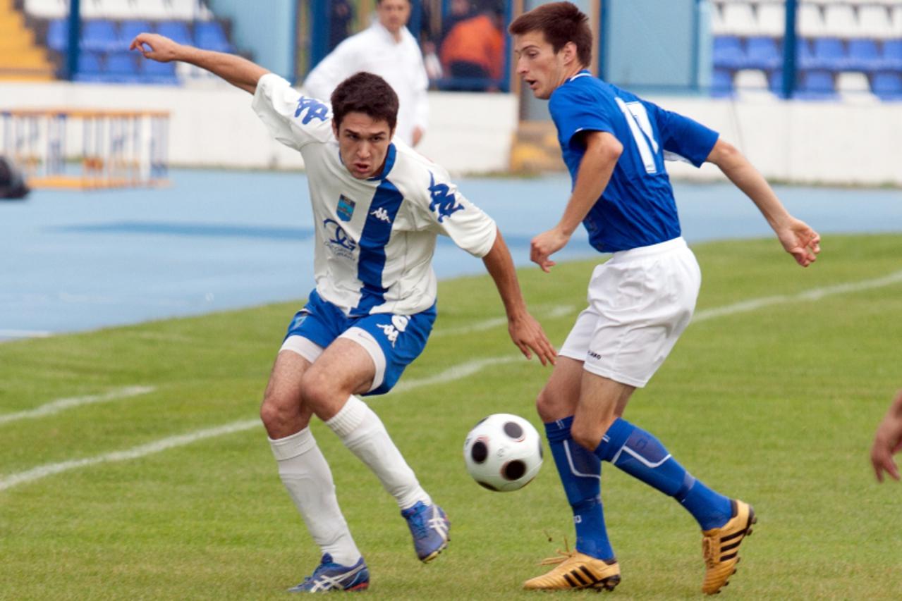 '25.09.2010., Osijek - Nogometnu utakmicu 9. kola 1. HNL odigrali su NK Osijek i NK Zadar. Ivan Milicevic i Igor Banovic.  Photo: Krunoslav Petric/PIXSELL'