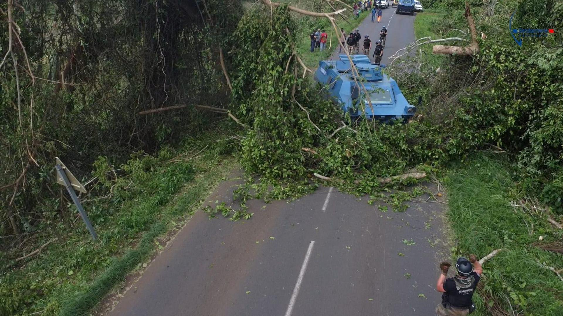 French Gendarmerie forces clear a road in the aftermath of Cyclone Chido, in Mayotte, France, in this picture released December 16, 2024. Gendarmerie Nationale/Handout via REUTERS THIS IMAGE HAS BEEN SUPPLIED BY A THIRD PARTY. NO RESALES. NO ARCHIVES. WATERMARK FROM SOURCE. BEST QUALITY AVAILABLE. Photo: GENDARMERIE NATIONALE/REUTERS