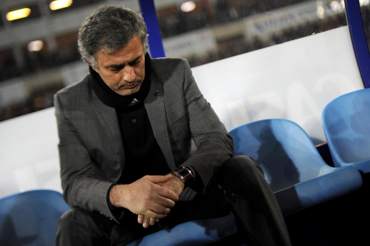 'Real Madrid\'s Portuguese coach Jose Mourinho gestures before during the Spanish league football match UD Almeria vs Real Madrid on January 16, 2011 at the Juegos Mediterraneos stadium in Almeria. Th