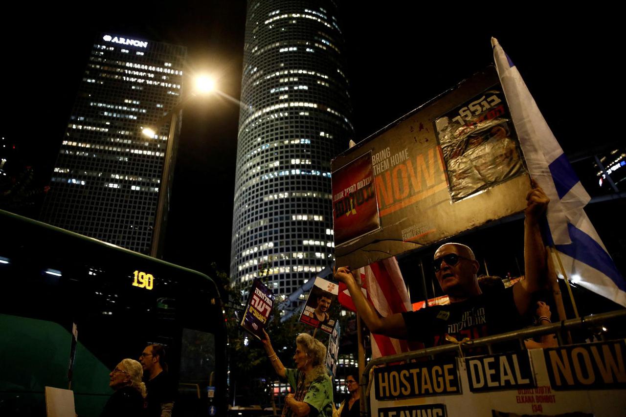 People protest demanding the immediate release of hostages who were kidnapped during the deadly October 7, 2023 attack, in Tel Aviv