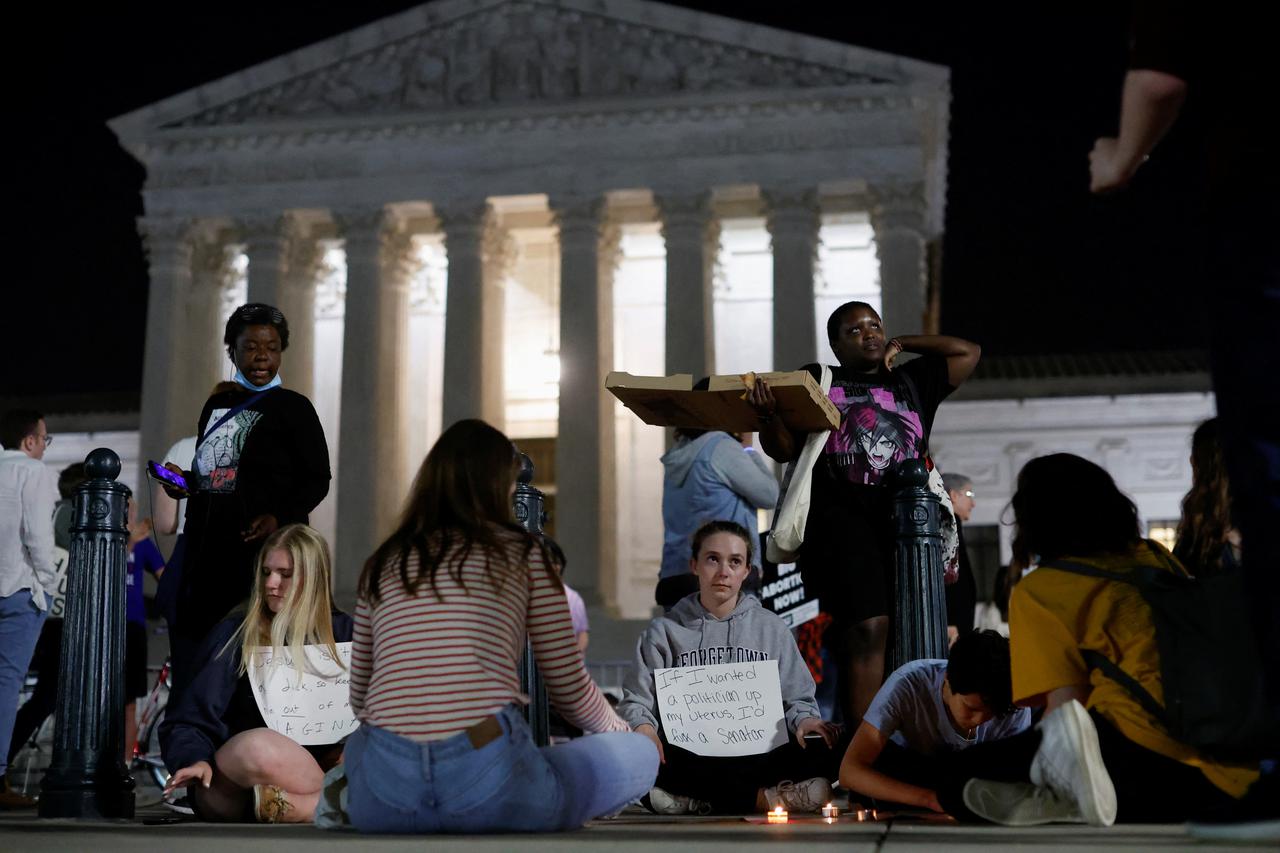 Protesters react outside the U.S. Supreme Court after the leak of a draft opinion preparing for a majority of the court to overturn the Roe v. Wade abortion rights decision in Washington