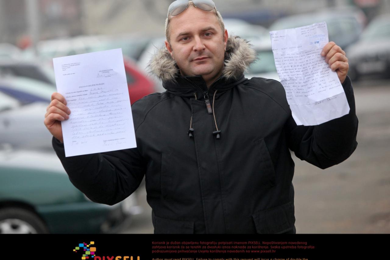 '29.12.2011., Zagreb - Damir Babic zaposlenik Zagreb parkinga koji je prijavio policiji da Zagreb parking radi sa tehnicki neispravnim vozilima. Photo: Igor Kralj/PIXSELL'