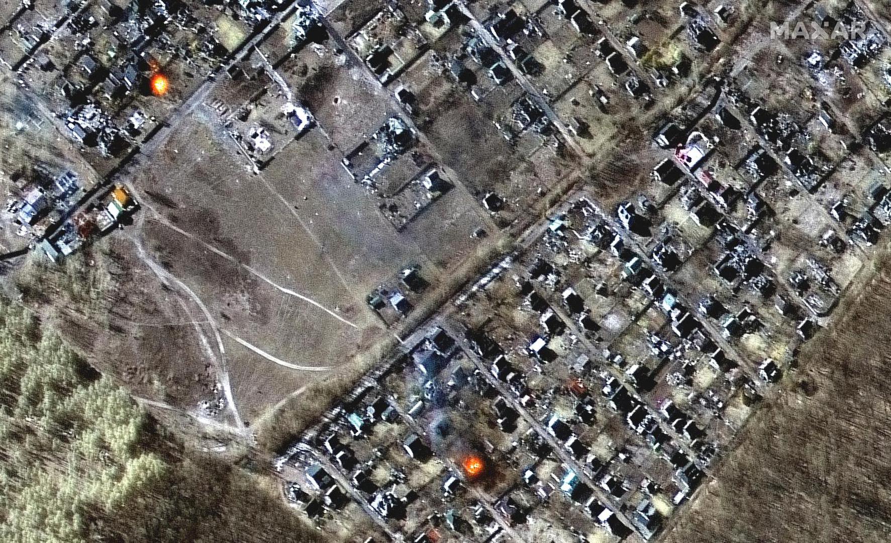 A satellite image shows a multispectral close up of burning homes, in Moschun, Ukraine March 11, 2022. Satellite image ©2022 Maxar Technologies/Handout via REUTERS ATTENTION EDITORS - THIS IMAGE HAS BEEN SUPPLIED BY A THIRD PARTY. MANDATORY CREDIT. NO RESALES. NO ARCHIVES. DO NOT OBSCURE LOGO. Photo: MAXAR TECHNOLOGIES/REUTERS