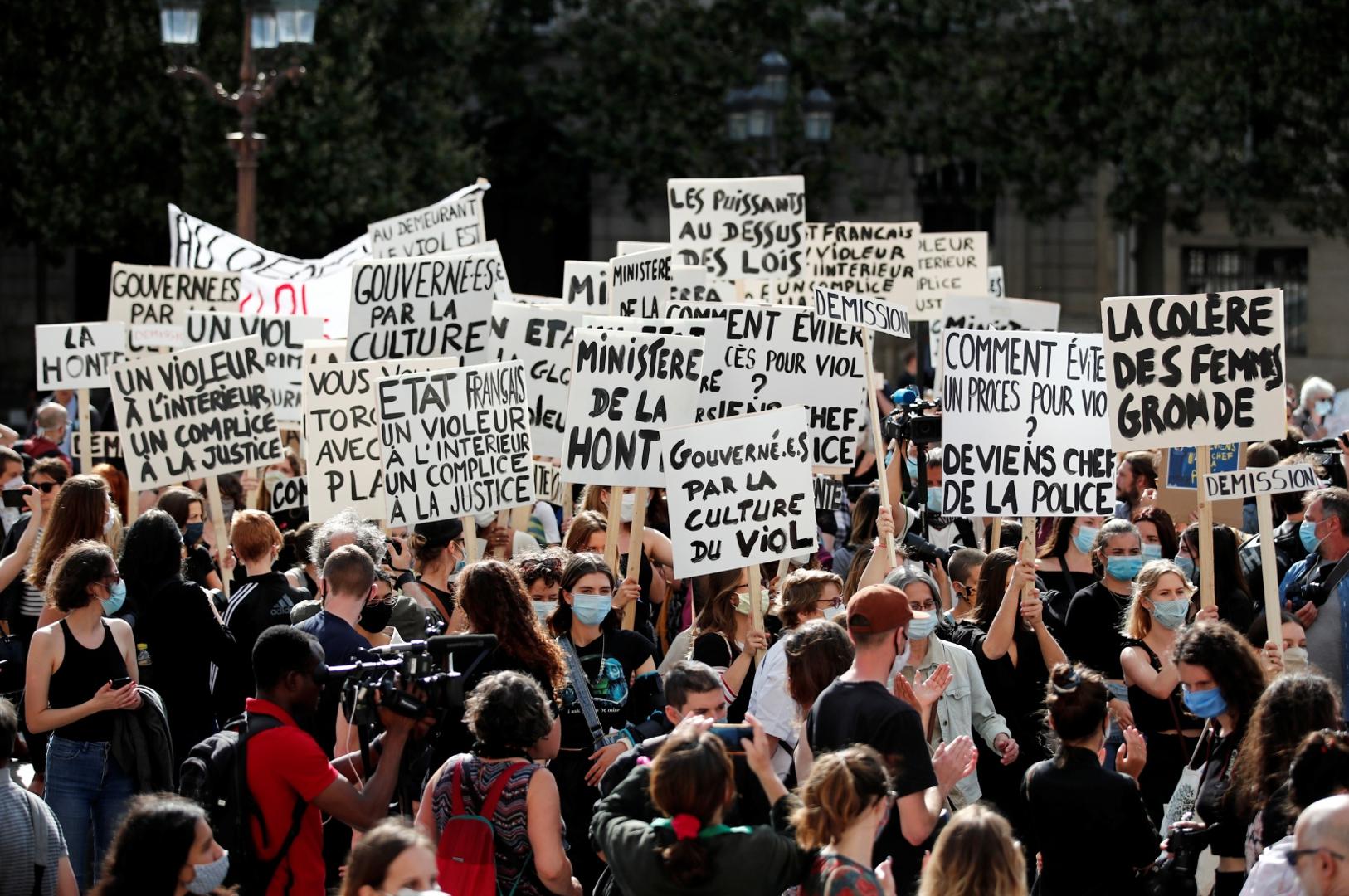 Feminist activists demonstrate against new government appointments in Paris Feminist activists hold placards during a demonstration against the appointments of French Interior Minister Gerald Darmanin and Justice Minister Eric Dupond-Moretti in the new French government, in front of the city hall in Paris, France, July 10, 2020. REUTERS/Benoit Tessier BENOIT TESSIER