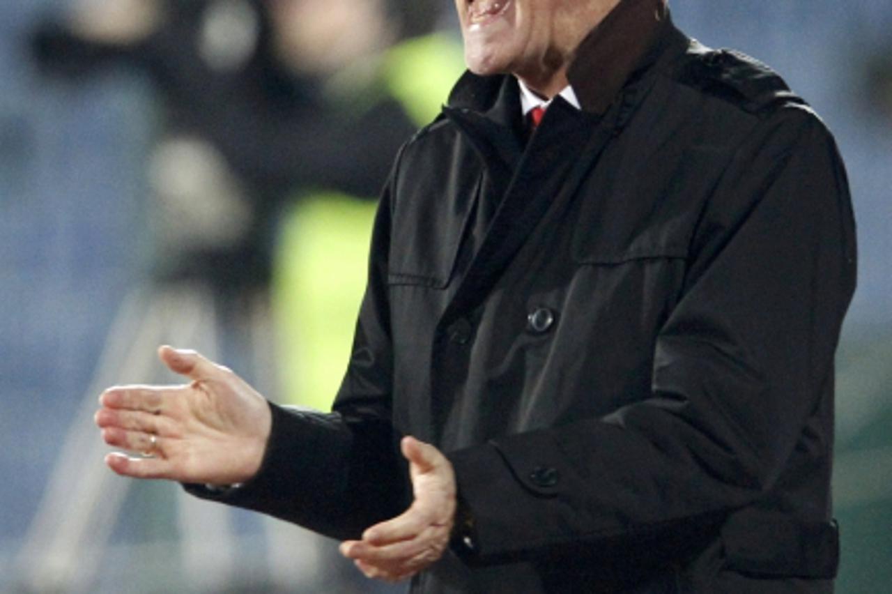 'Switzerland\'s head coach Ottmar Hitzfeld reacts during the match against Bulgaria during their Euro 2012 qualifying Group G soccer match in Sofia, March 26, 2011.  REUTERS/Oleg Popov (BULGARIA  - Ta