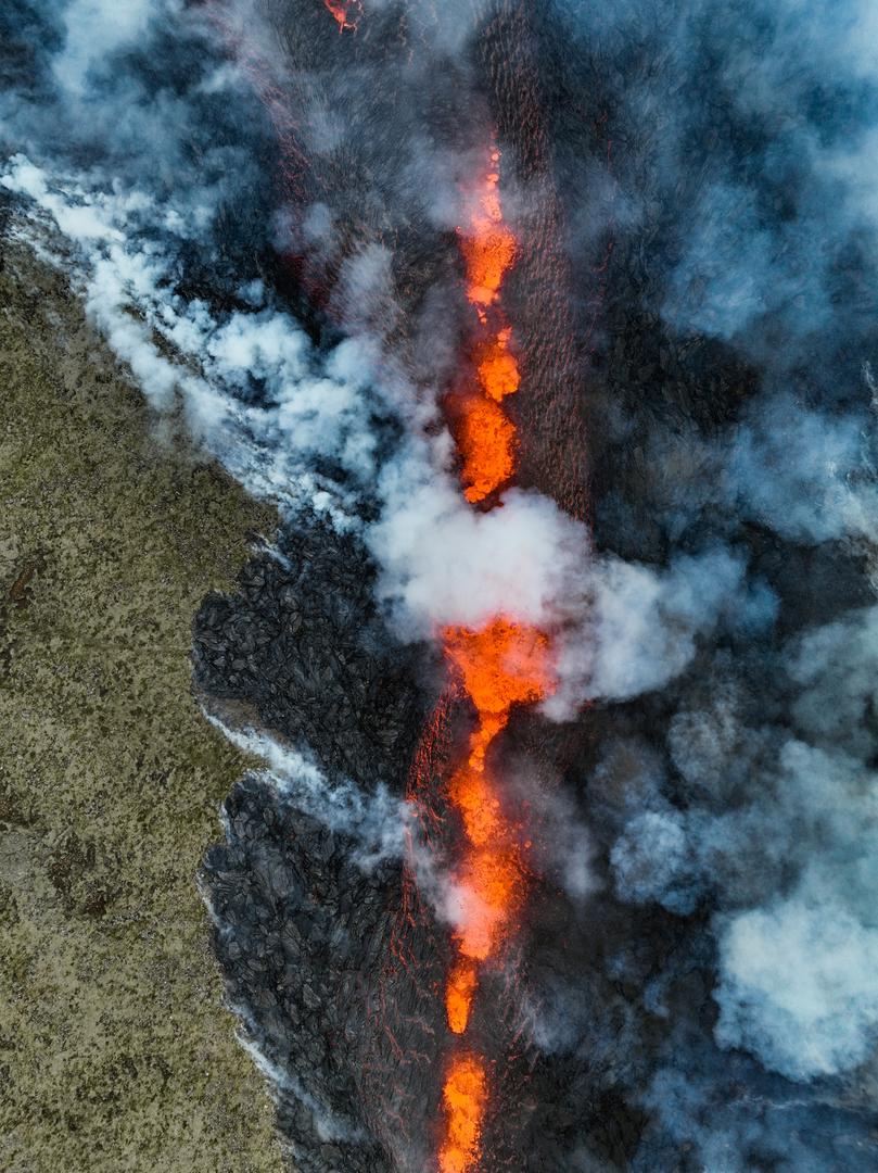 Smoke billows and lava spurts after the eruption of a volcano, on the Reykjanes peninsula, near the capital Reykjavik, in southwest Iceland, July 10, 2023, in this picture obtained from social media. Juergen Merz - Glacier Photo Artist/via REUTERS  THIS IMAGE HAS BEEN SUPPLIED BY A THIRD PARTY. MANDATORY CREDIT. NO RESALES. NO ARCHIVES. Photo: JUERGEN MERZ - GLACIER PHOTO ART/REUTERS