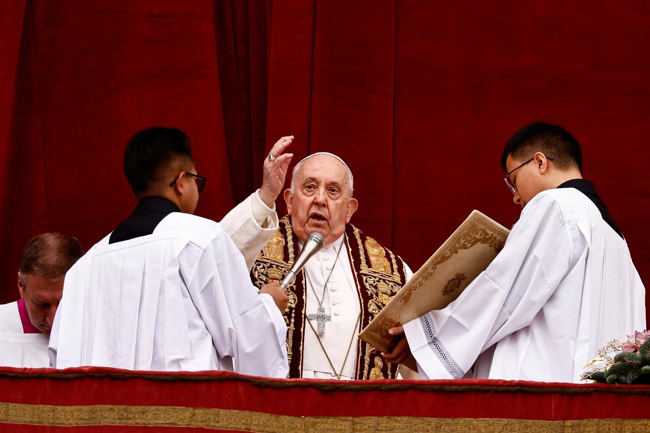 Pope Francis delivers his traditional Christmas Day Urbi et Orbi message at the Vatican