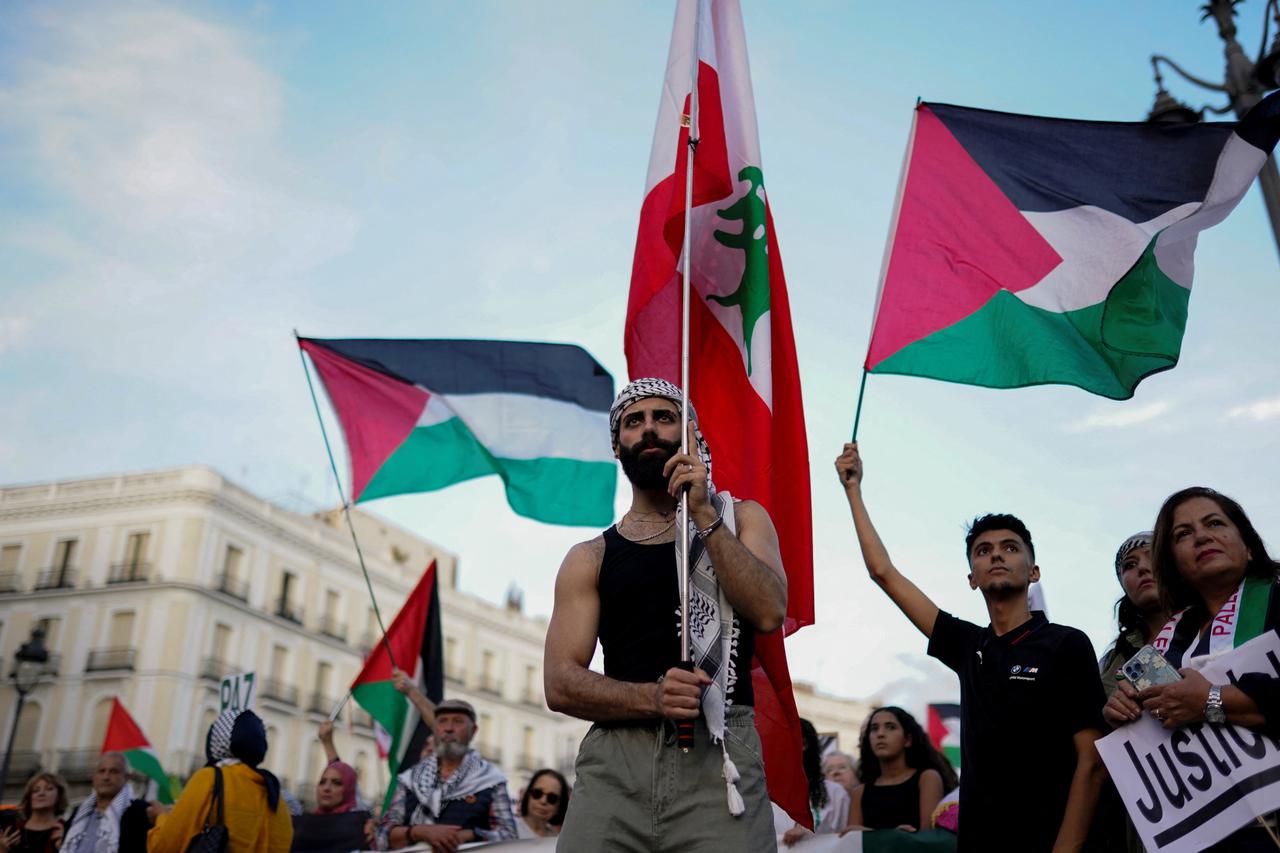 People demonstrate ahead of the October 7th attack anniversary, in Madrid