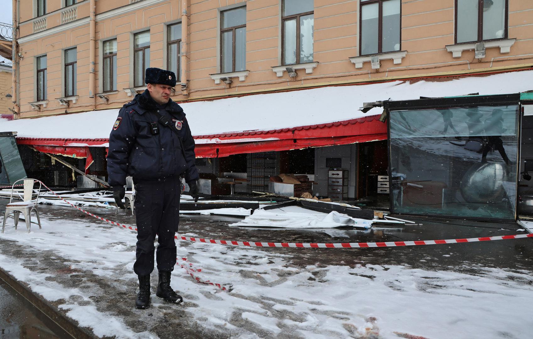 A police officer stands guard at the scene of the cafe explosion in which Russian military blogger Vladlen Tatarsky, (real name Maxim Fomin) was killed the day before in Saint Petersburg, Russia April 3, 2023. REUTERS/Anton Vaganov Photo: ANTON VAGANOV/REUTERS