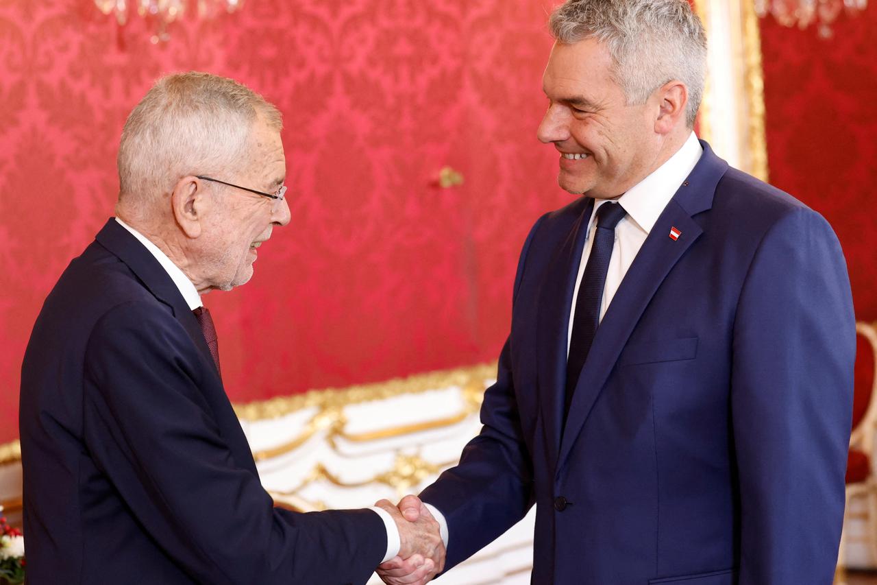 Austrian President Alexander Van der Bellen  welcomes Chancellor and head of People's Party Karl Nehammer in Vienna