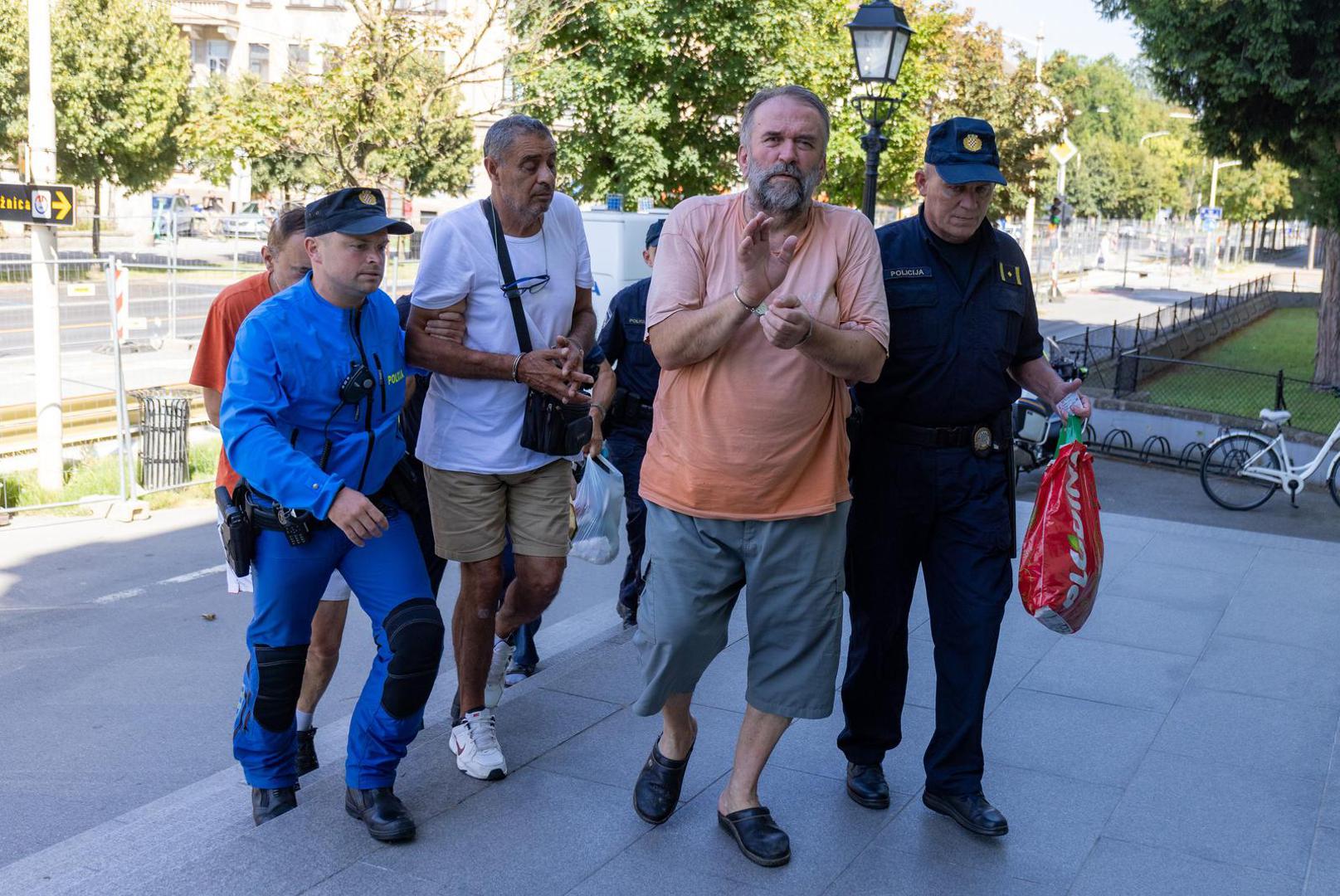 11.07.2024., Osijek - Zupanijski sud, Privodjenje petorice uhicenih, osumnjicenih za ratni zlocin sucu istrage. Photo: Davor Javorovic/PIXSELL