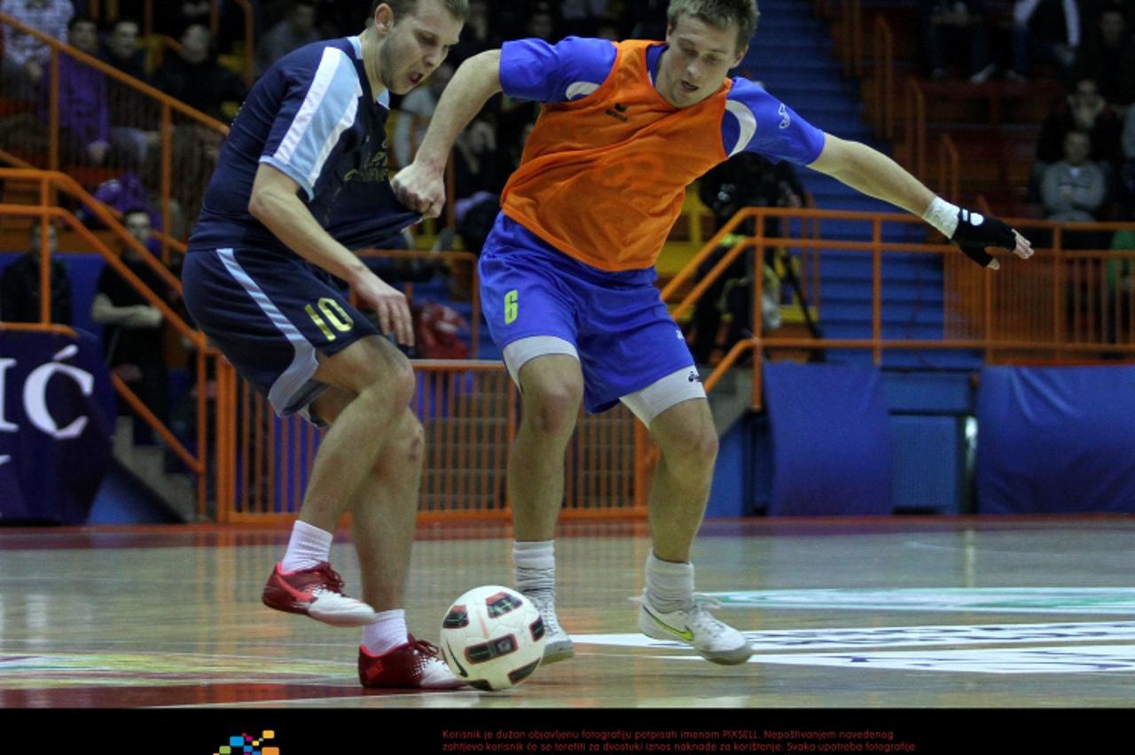 '28.12.2011., Zagreb - Polufinale malonogometnog turnira Kutija sibica 2011, GPV Elkro - MNK Cvjetno Poliklinika Milojevic. Josip Suton, Bojan Kubovic. Photo: Anto Magzan/PIXSELL'