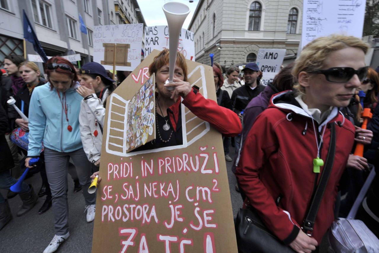 'Members of the union attend a public workers strike in Ljubljana  April 18, 2012. Thousands of teachers, doctors, police officers and other public workers went on strike in Slovenia over proposed pay