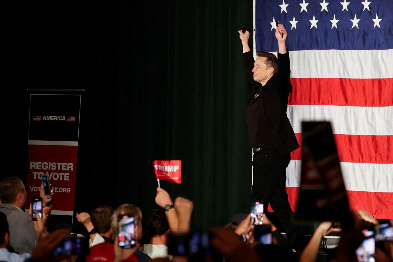 Tesla CEO and X owner Elon Musk speaks about voting during an America PAC Town Hall, in Folsom