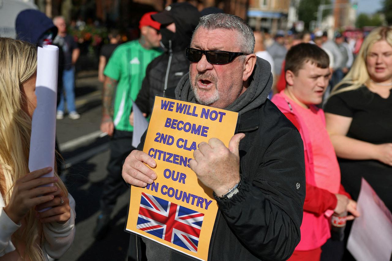 FILE PHOTO: Protesters attend an anti-immigration protest in Belfast