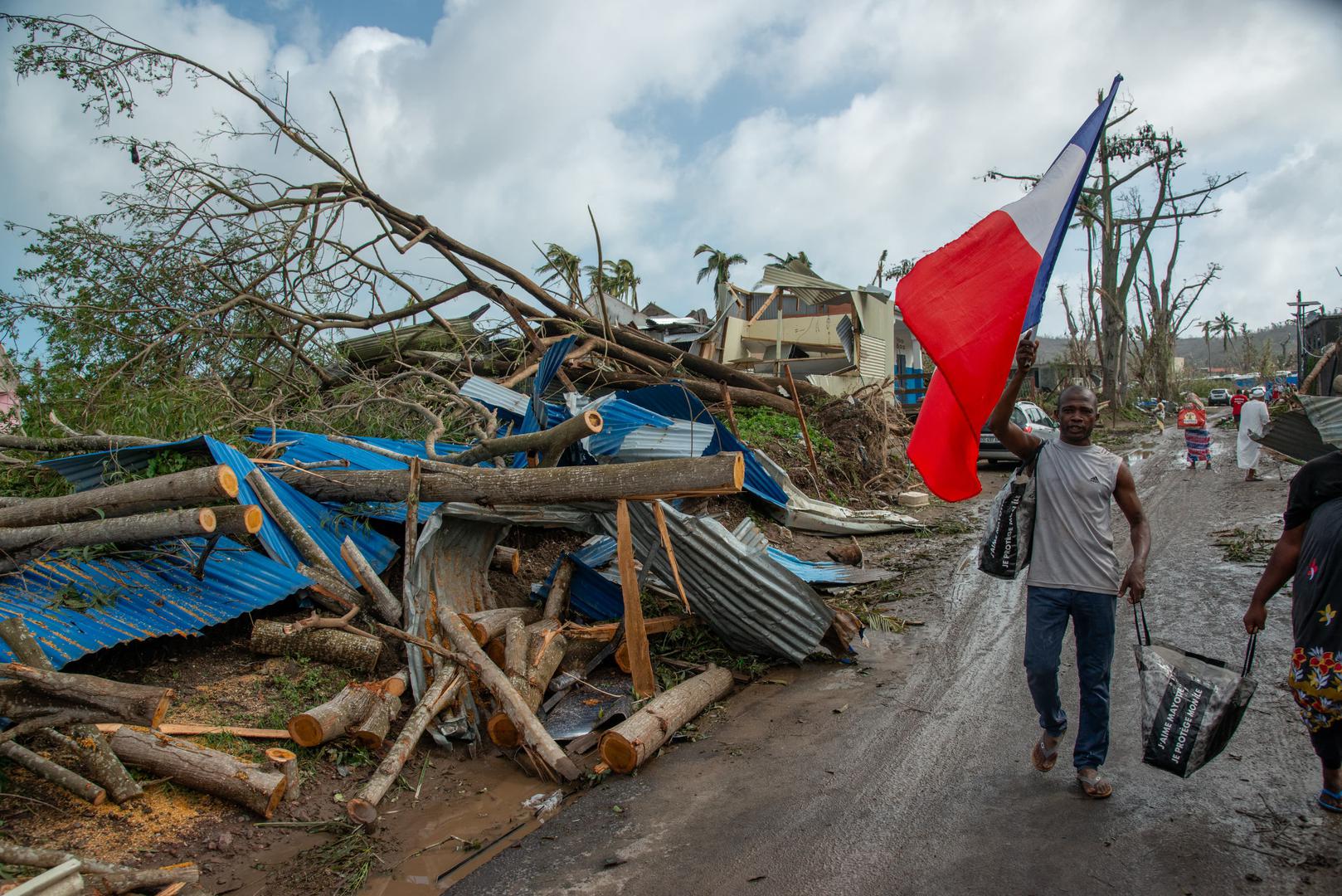 A scene of devastation after the cyclone Chido hit France’s Indian Ocean territory of Mayotte, on December 14, 2024 in the Bandrajou Kaweni district of the capital Mamoudzou. At least several hundred people are feared to have been killed after the worst cyclone in almost a century ripped through the French Indian Ocean territory of Mayotte on Saturday, uprooting trees, tearing houses apart and pounding the impoverished archipelago’s already weak infrastructure. Rescuers have been dispatched to the islands, which lie between the coast of Mozambique and Madagascar, but their efforts are likely to be hindered by damage to airports and electricity distribution in an area where clean drinking water is subject to chronic shortages. Photo by David Lemor/ABACAPRESS.COM Photo: Lemor David/ABACA/ABACA