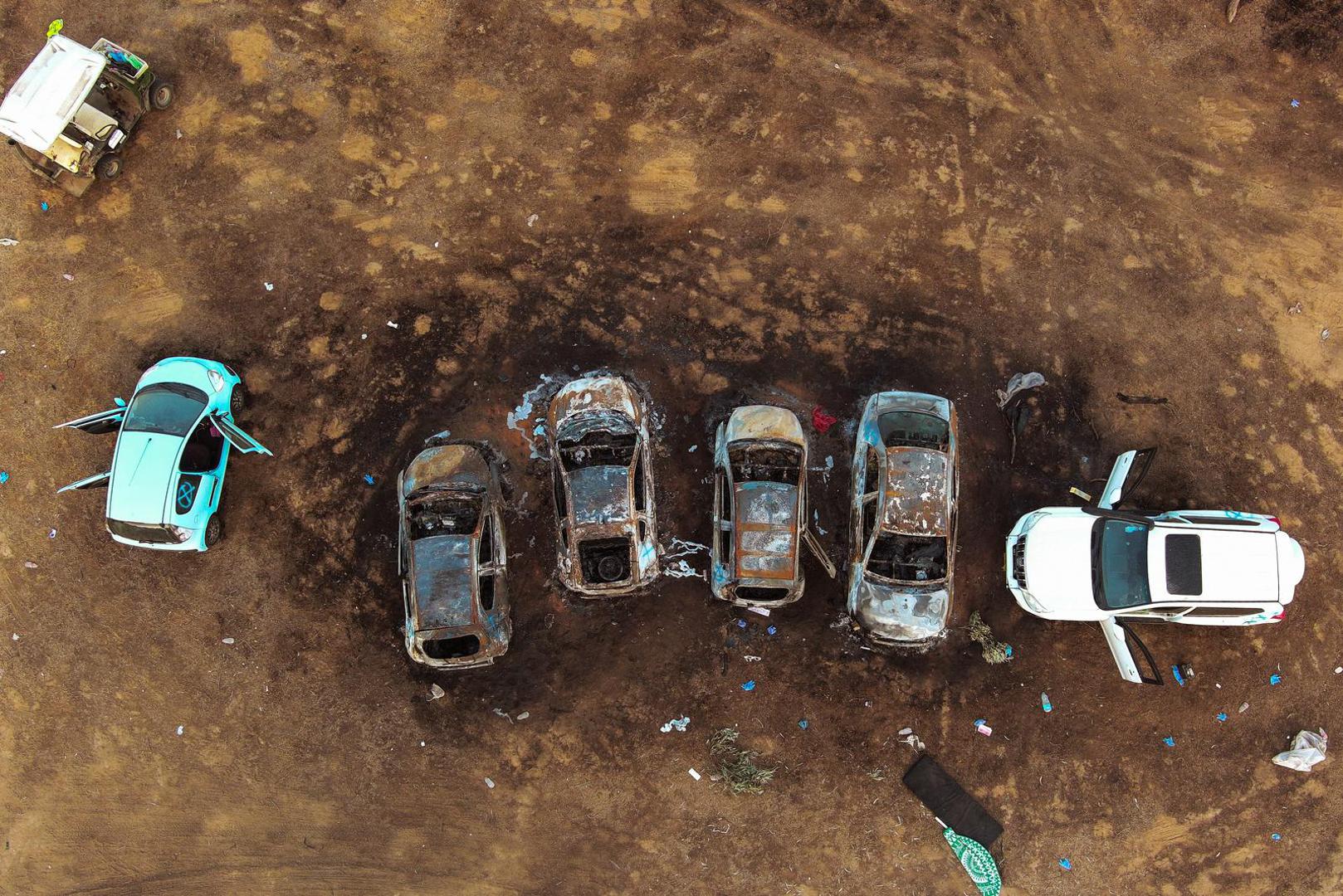 An aerial view shows the burnt cars of festival-goers at the site of an attack on the Nova Festival by Hamas gunmen from Gaza, near Israel's border with the Gaza Strip, in southern Israel, October 12, 2023. REUTERS/Ilan Rosenberg Photo: ILAN ROSENBERG/REUTERS