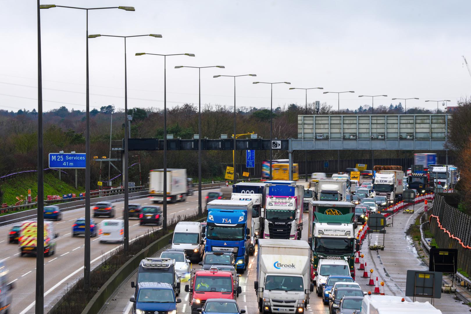 Traffic on the M25 motorway near junction 10 for the A3. Weather warnings remain in force across much of the UK on Monday with adverse conditions, including flooding from heavy rain and thawing snow. Picture date: Monday January 6, 2025. Photo: Ben Whitley/PRESS ASSOCIATION